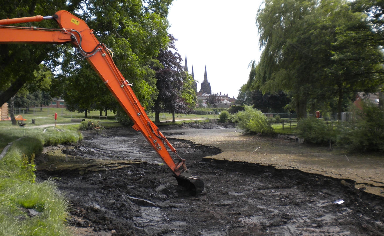 Dredging the drained lake