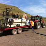 Hydraulic seed rig is transported on a trailor