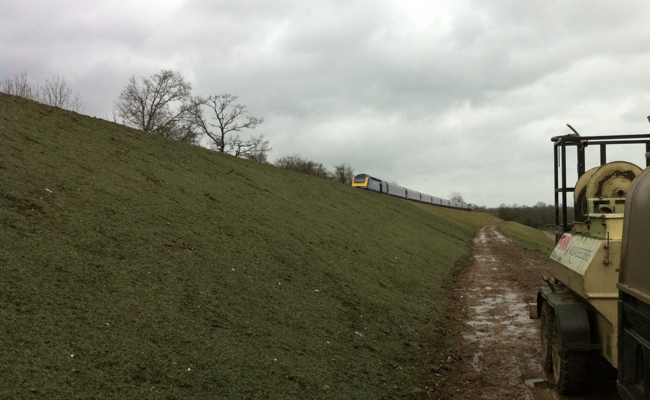 Rodbourne railway embankment sprayed with HydraCX for rapid vegetation