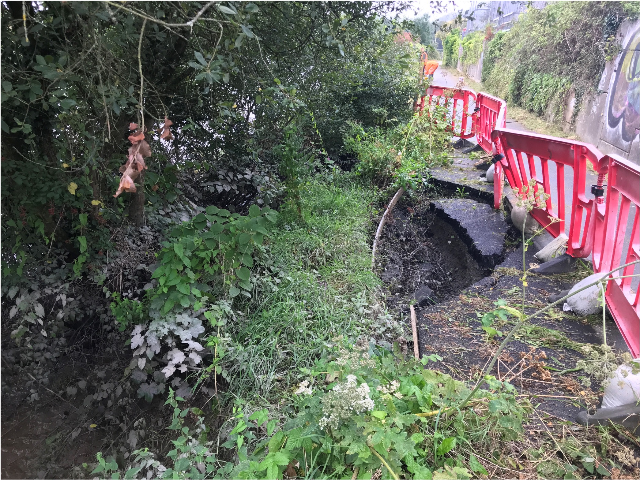 90 metres of bank erosion had eroded the bank and caused the footpath to collapse into the River Towy in the centre of Carmarthen